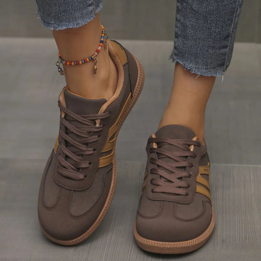 Dark Brown retro stripe walking sneakers with gold accents and lace-up closure.