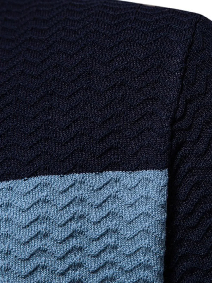 Chevron stripe knit polo shirt in dark navy and light blue with textured chevron pattern.