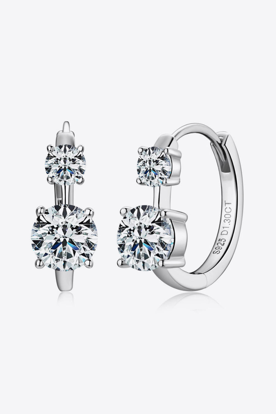 Silver double stone huggie hoop earrings with sparkling cubic zirconia.