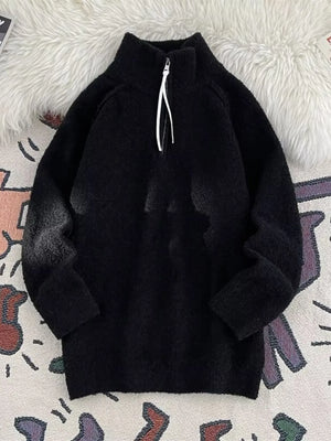 Men's black half-zip sweater with high neck and fuzzy texture.