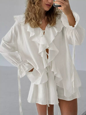 White relaxed blouse with v-neck