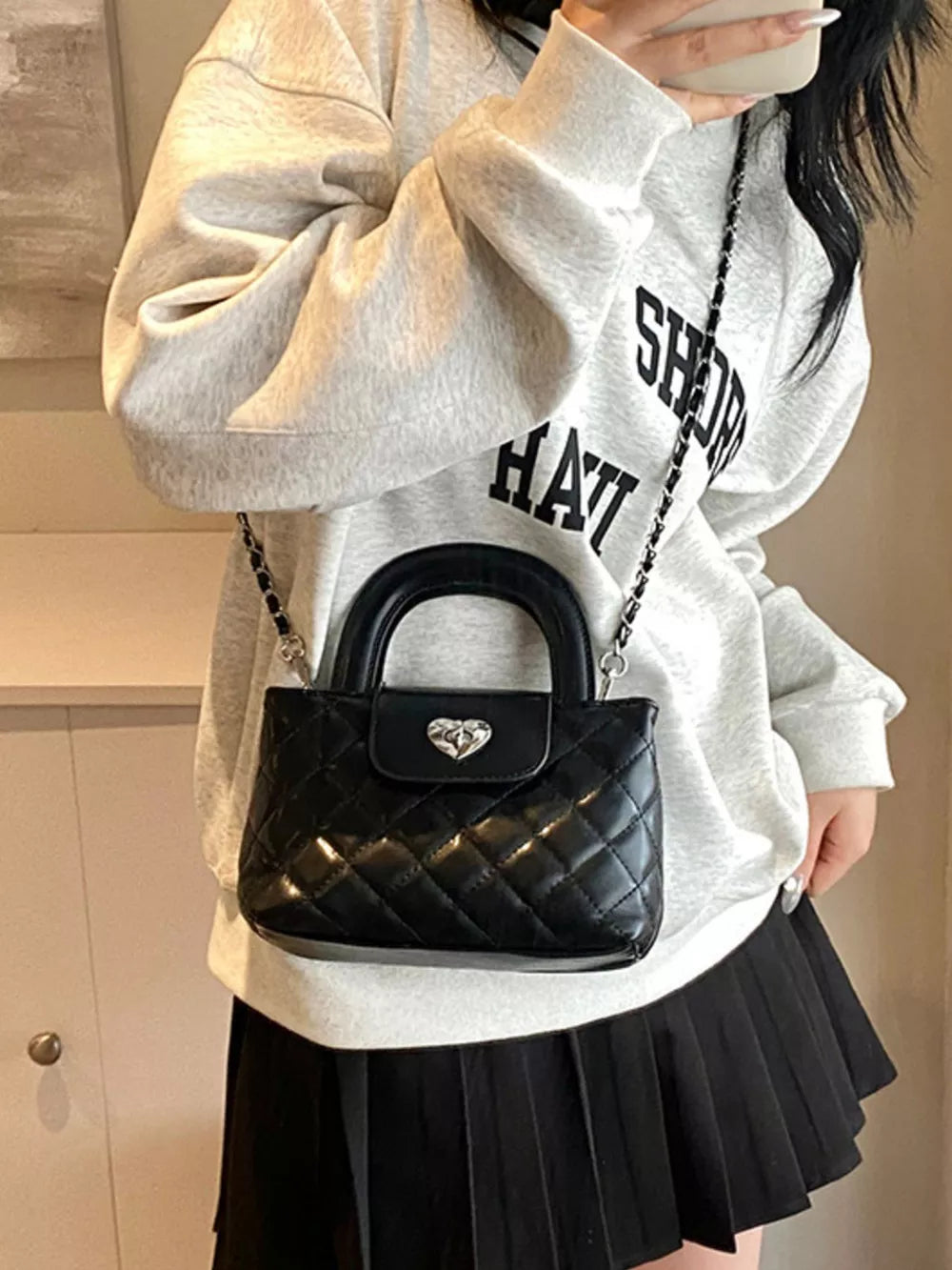 Quilted Heart Lock Crossbody Bag in Black