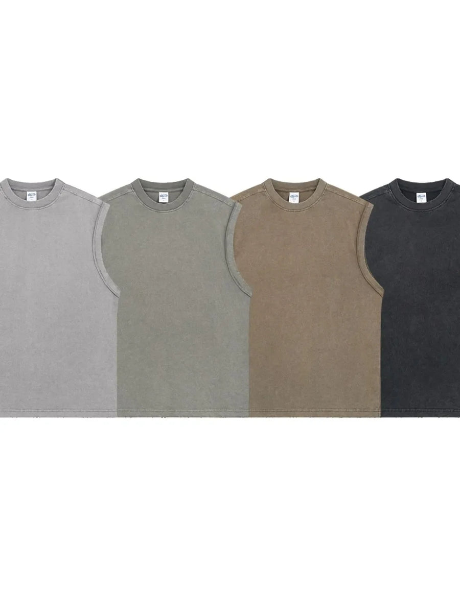 Washed cotton muscle tees in gray, sage, khaki, and black, relaxed fit, crew neck.