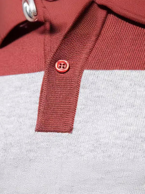 Colorblock knit polo shirt in burgundy and gray with ribbed collar and button detail.
