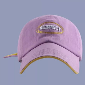 Purple baseball cap with embroidered "RESPECT" detail and yellow trim
