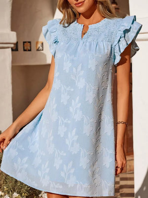 Sky blue floral embossed mini dress with smocked bodice and ruffled sleeves.