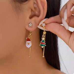 earrings in gold with novelty and asymmetrical design