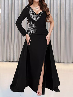 maxi dress in black featuring rhinestone and fitted fit