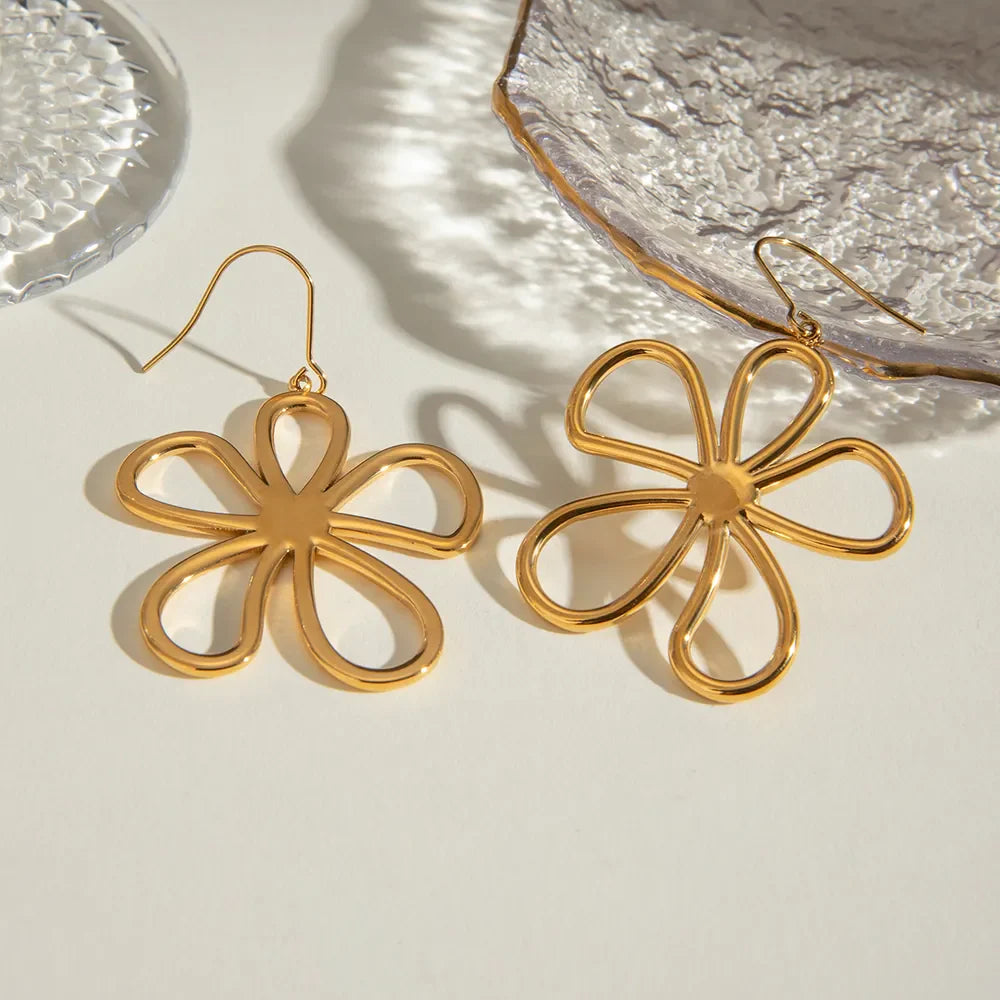 Gold sculpted petal drop earrings with 18K gold plating.