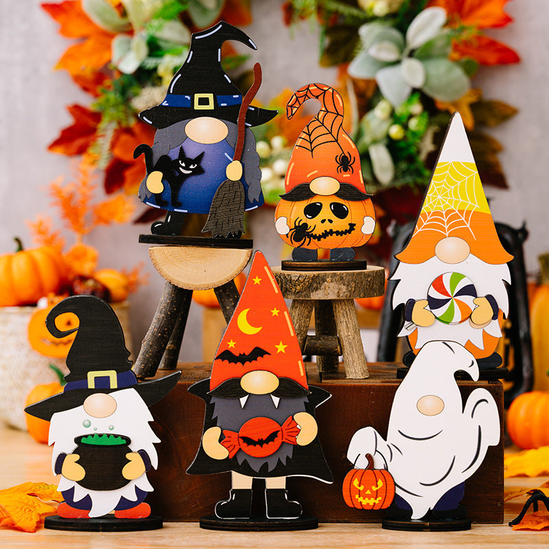 Halloween gnome figurines in assorted styles and colors, including witch, pumpkin, and ghost designs.