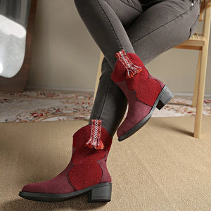 Burgundy suede and felt ankle boots with decorative tassels and stitching detail.