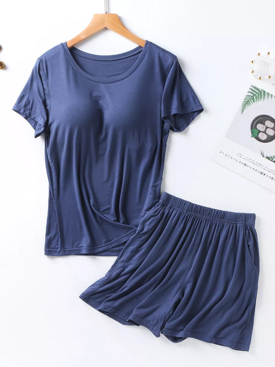 Space Blue two-piece pajama set with crew neck tee and elastic waistband shorts with pockets.
