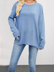 crewneck sweater in sky blue featuring exposed seam and loose fit