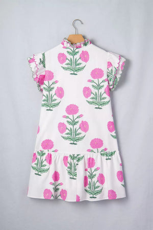 White mini dress with pink floral print, ruffled neckline, and scalloped flutter sleeves.