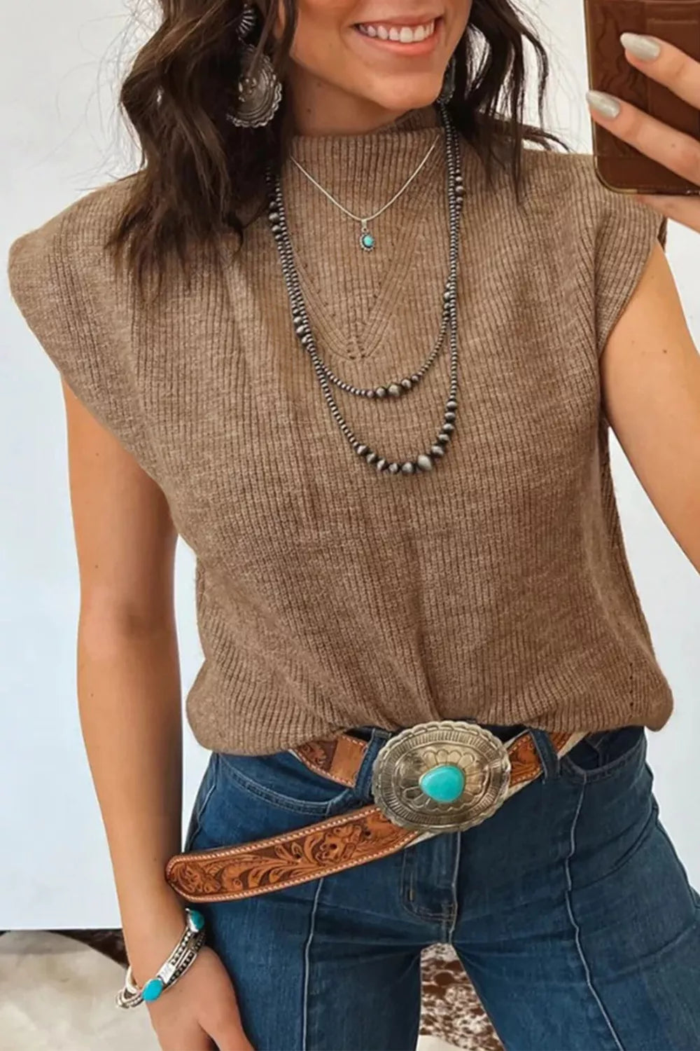 Brown ribbed knit mock neck sweater vest with cap sleeves.