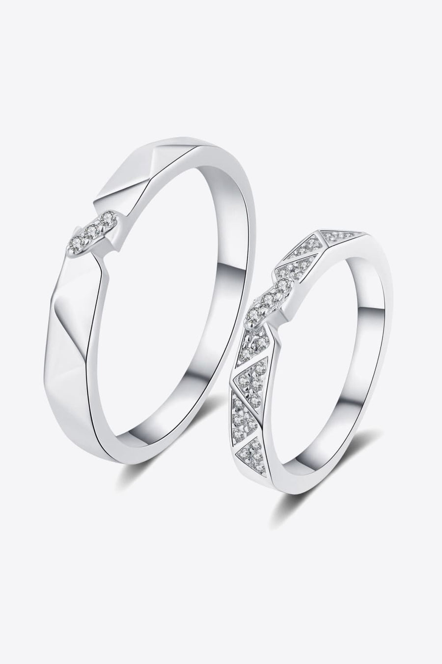 Geometric rhodium pavé ring set with cubic zirconia accents for men and women.