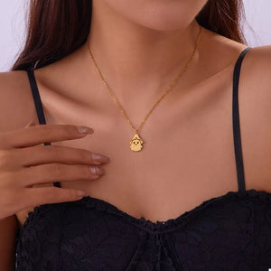 necklace in gold featuring pendant and straight fit
