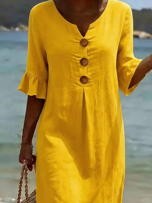 Yellow casual dress with ruffled sleeves and button detail.