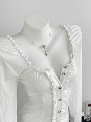 white blouse with frill and long sleeve