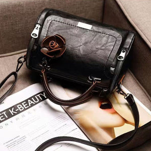 crossbody bag in cognac with top handle and small