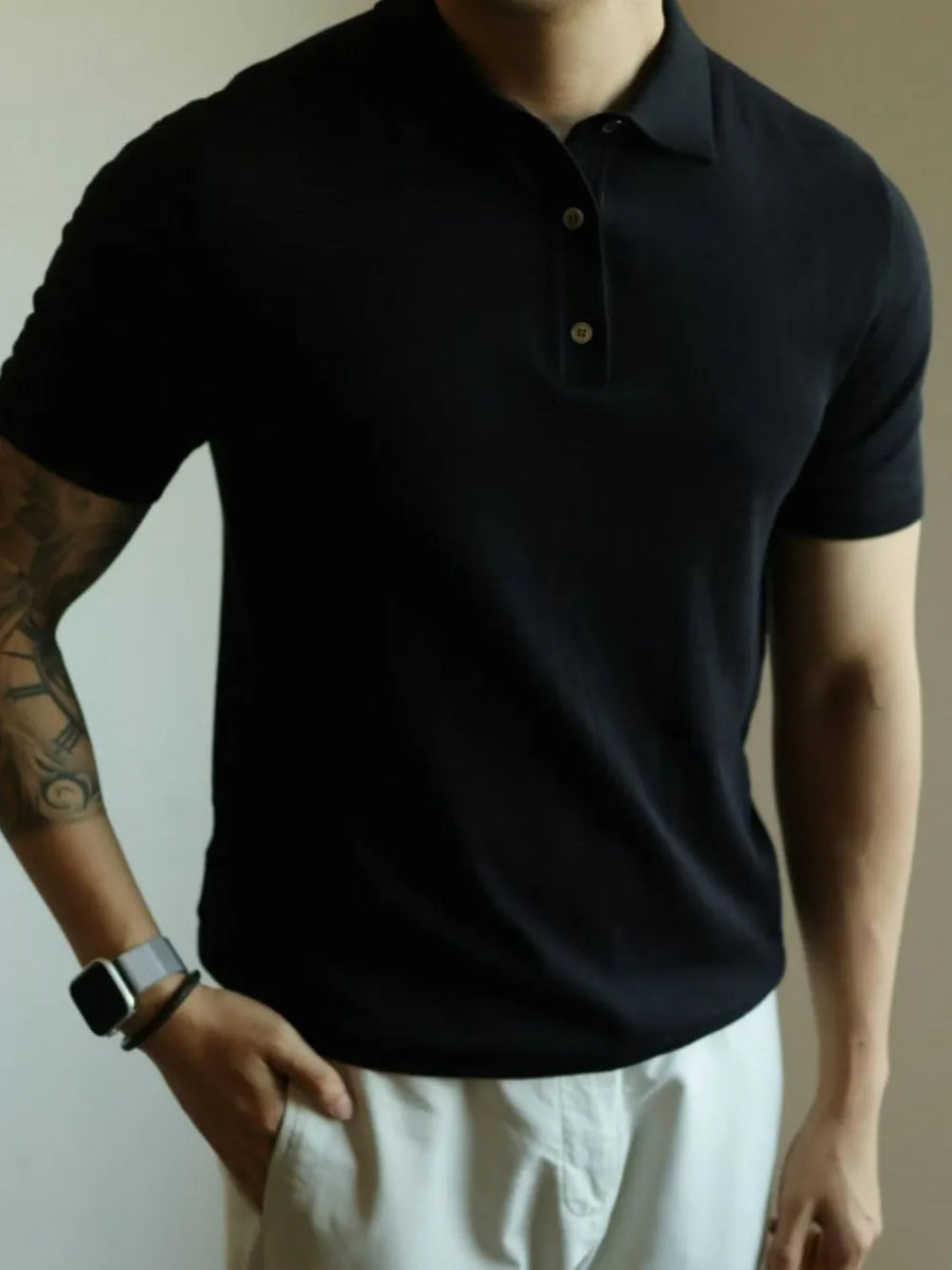 Black fine-gauge knit polo shirt with a refined button placket.