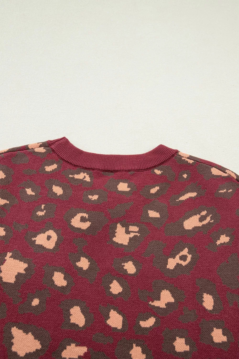 pullover sweater in peach with leopard and pocketed