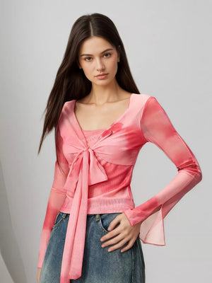 Watercolor tie-front t-shirt with flared sleeves in pink, featuring a V-neck and long sleeves.