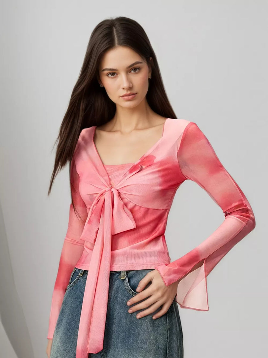 Watercolor tie-front t-shirt with flared sleeves in pink, featuring a V-neck and long sleeves.