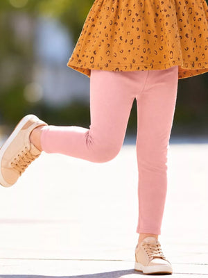 90% cotton, 10% polyester Care instructions: Machine wash cold peplum top in Caramel with A-line silhouette