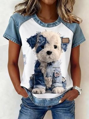 White t-shirt with denim patchwork sleeves and a distressed denim puppy graphic.