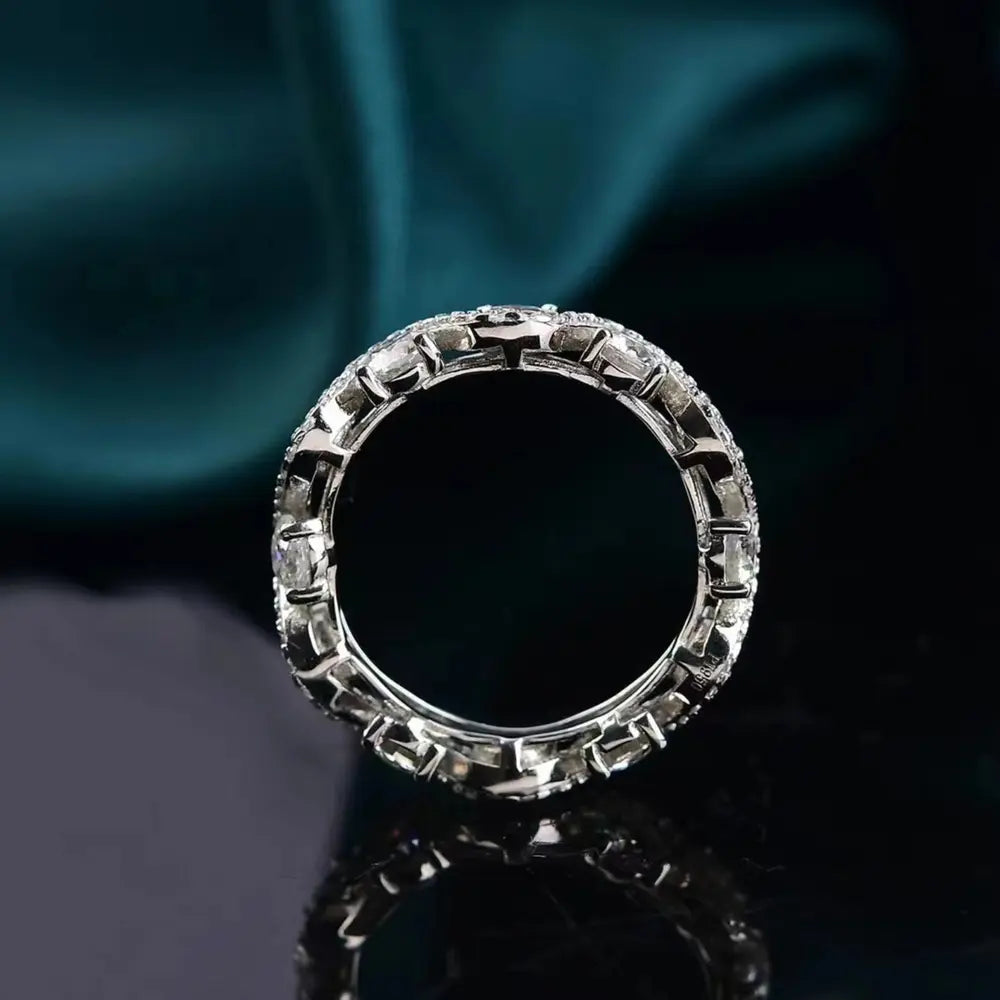 Silver moissanite eternity wave ring with sparkling stones