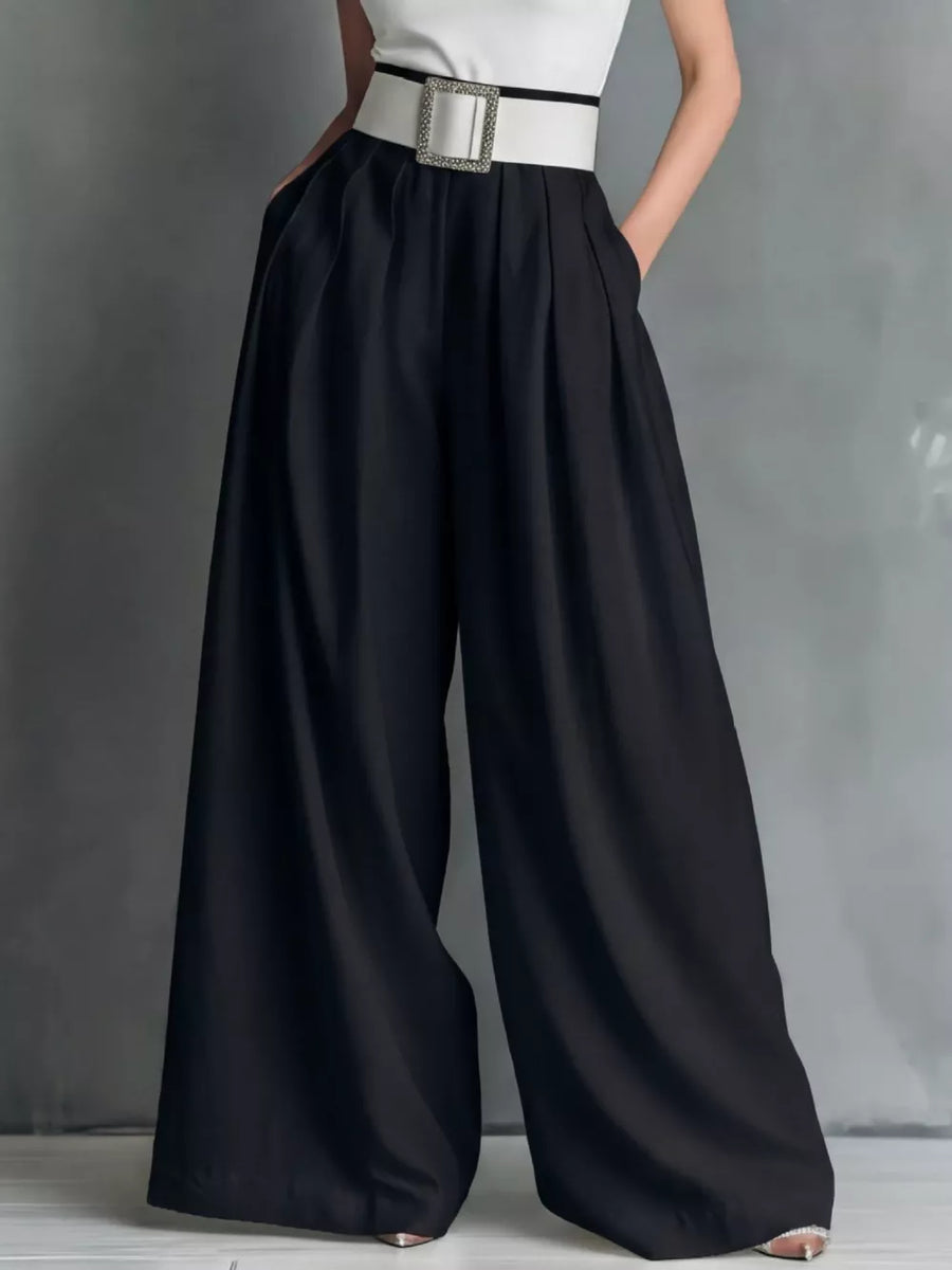 Black belted high-waisted wide-leg maternity pants with a decorative buckle.