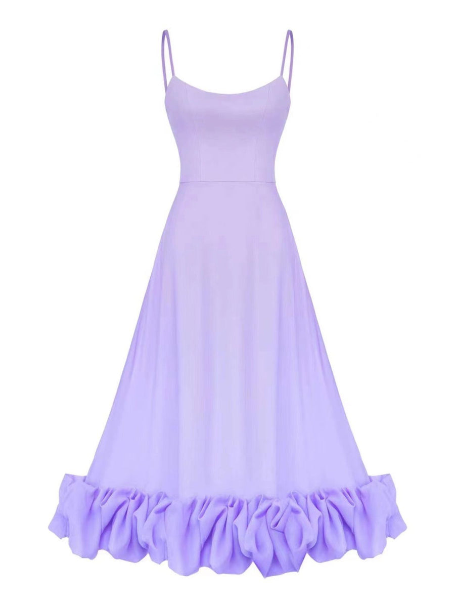 Lavender midi dress with spaghetti straps and a ruffled hem.