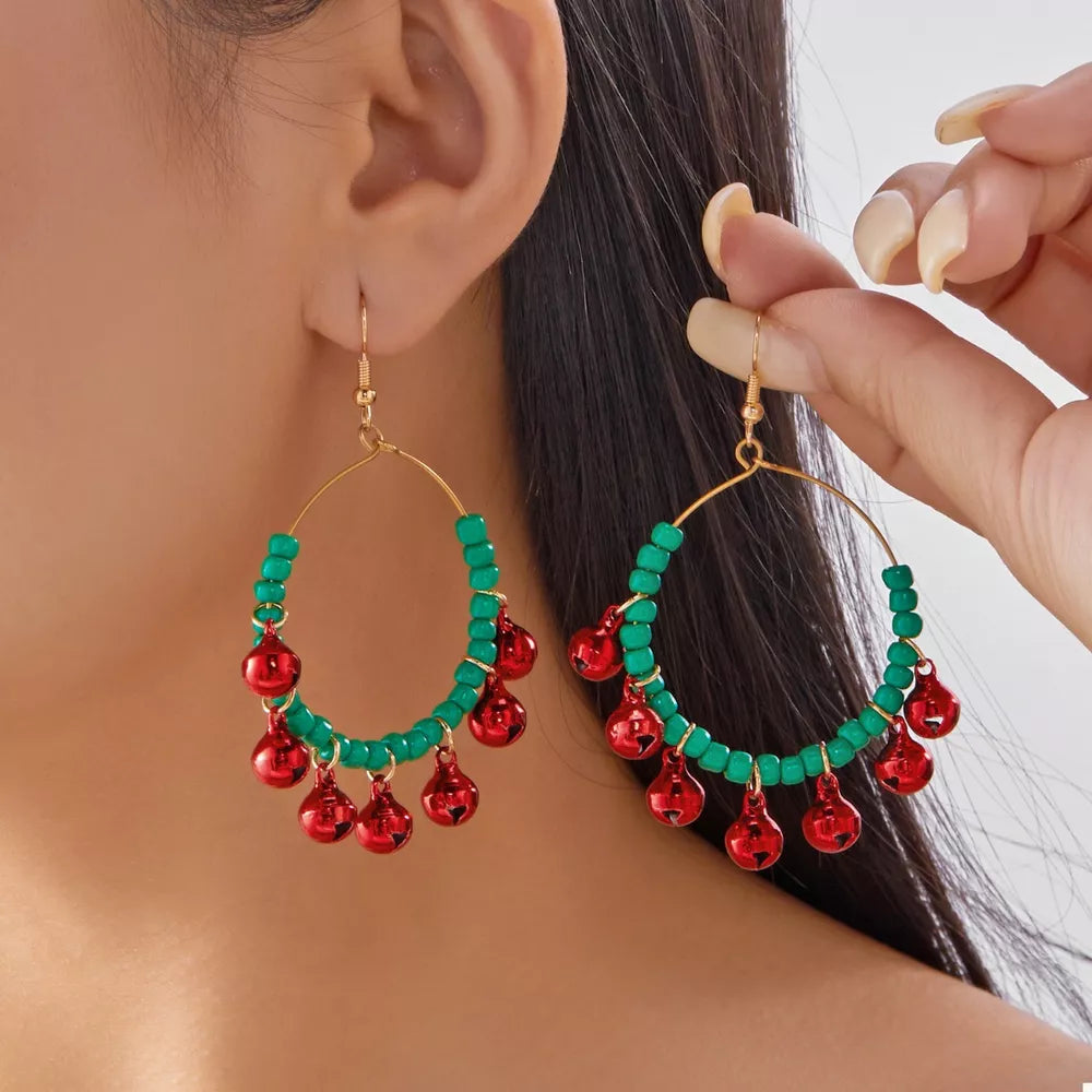 earrings in emerald green featuring beaded and hoop fit