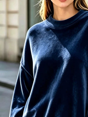 100% polyester Care instructions: Machine wash cold sweatshirt in Sky Blue with oversized silhouette
