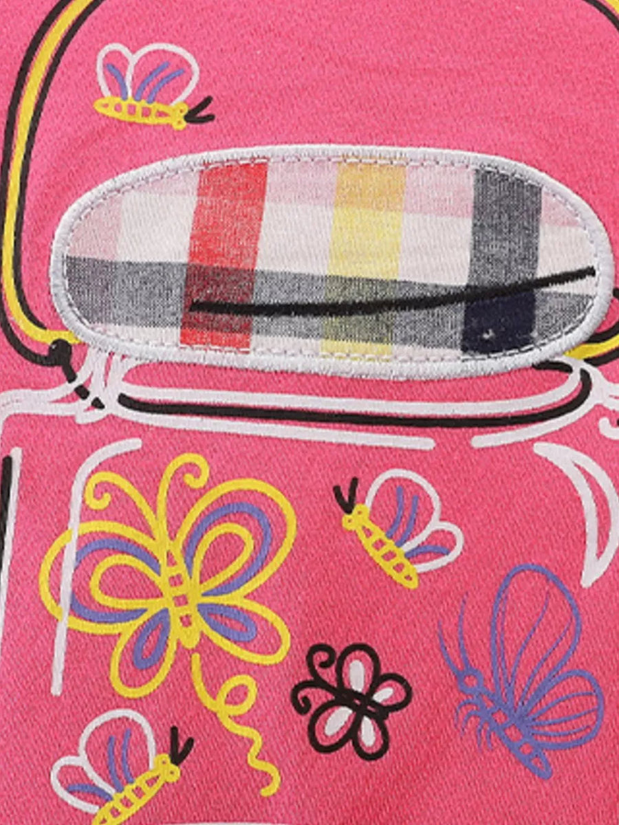 Pink cotton tee with butterfly graphics and plaid patch detail.