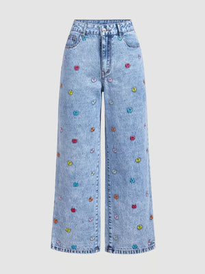 wide-leg jeans in light blue denim featuring buttoned and wide-leg fit