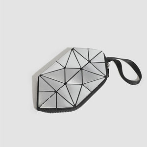 Silver clutch featuring metallic and geometric