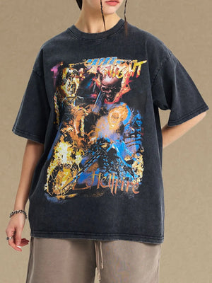 Black vintage graphic tee with oversized fit and bold fiery skull print
