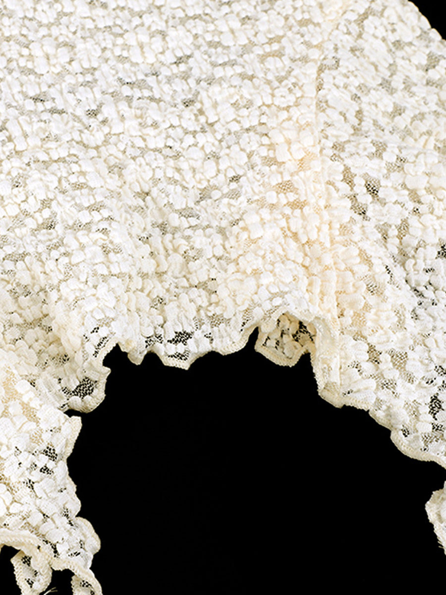 Lace ruffle cami top in beige with a textured floral pattern and scalloped hem.