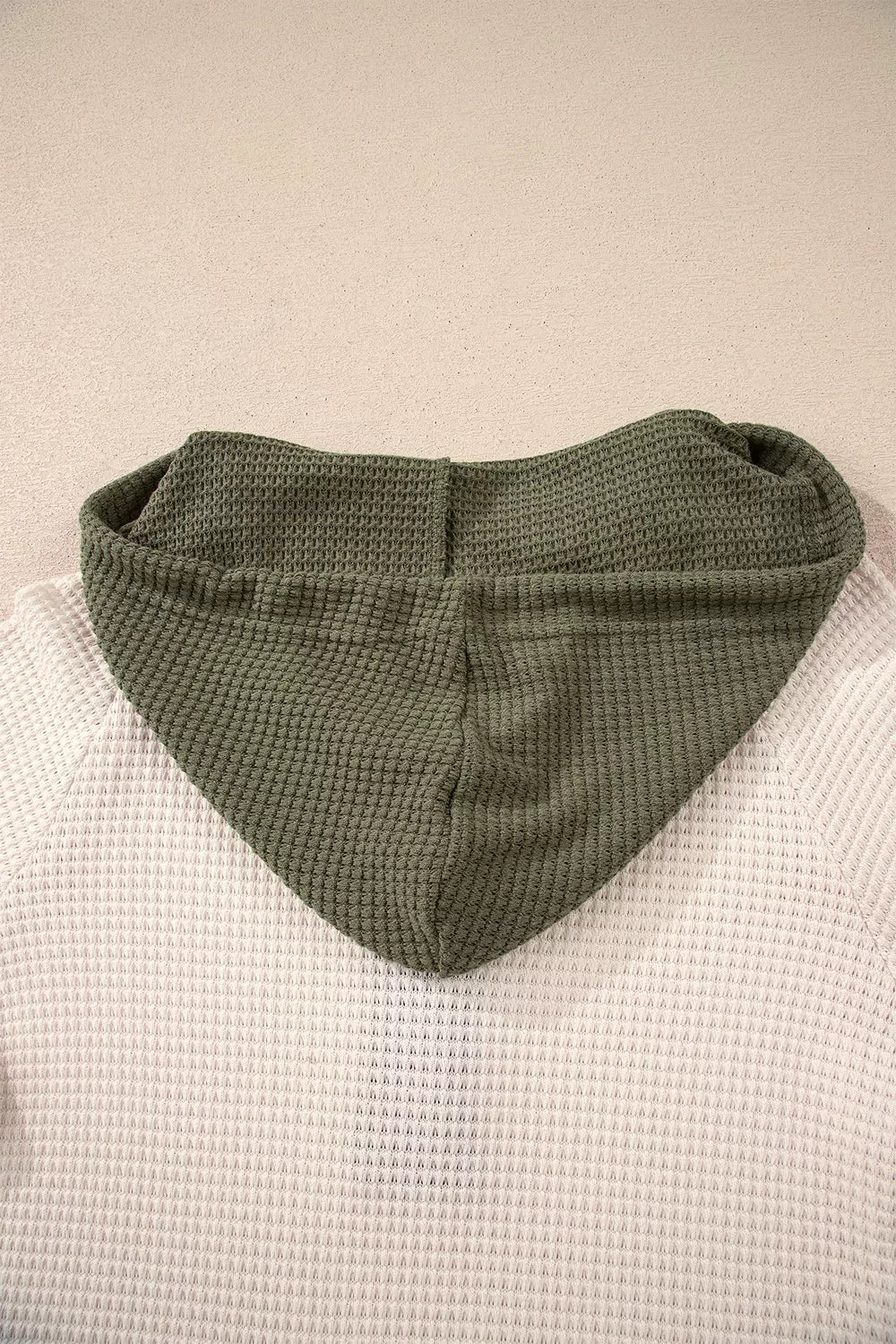ivory pullover hoodie with buttoned and long sleeve