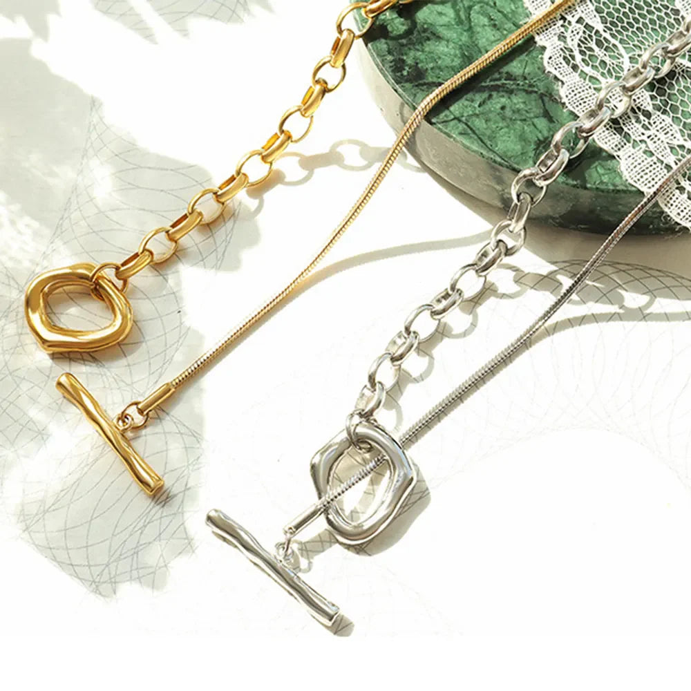 Gold and silver asymmetrical chain necklaces with toggle bar closure