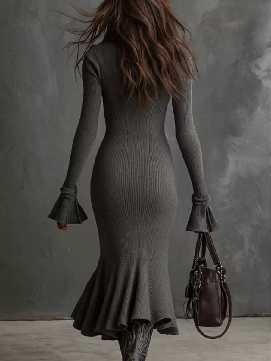 100% polyester Care instructions: Machine wash cold sweater dress in Black with fitted silhouette