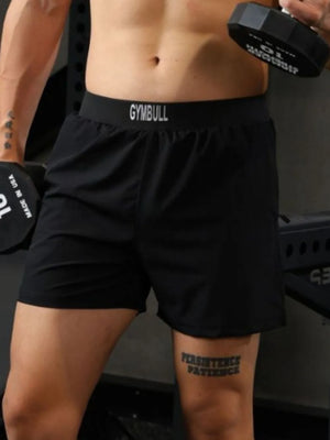 Black performance training shorts with a white logo waistband.