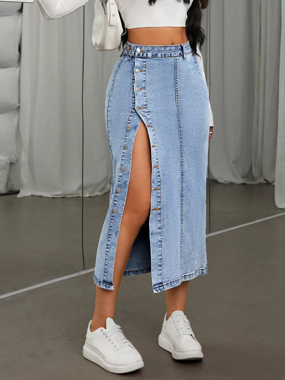 midi skirt in light blue featuring buttoned and straight fit