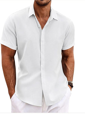 Men's white short sleeve button-down shirt with rolled cuffs, cotton blend, casual fit.