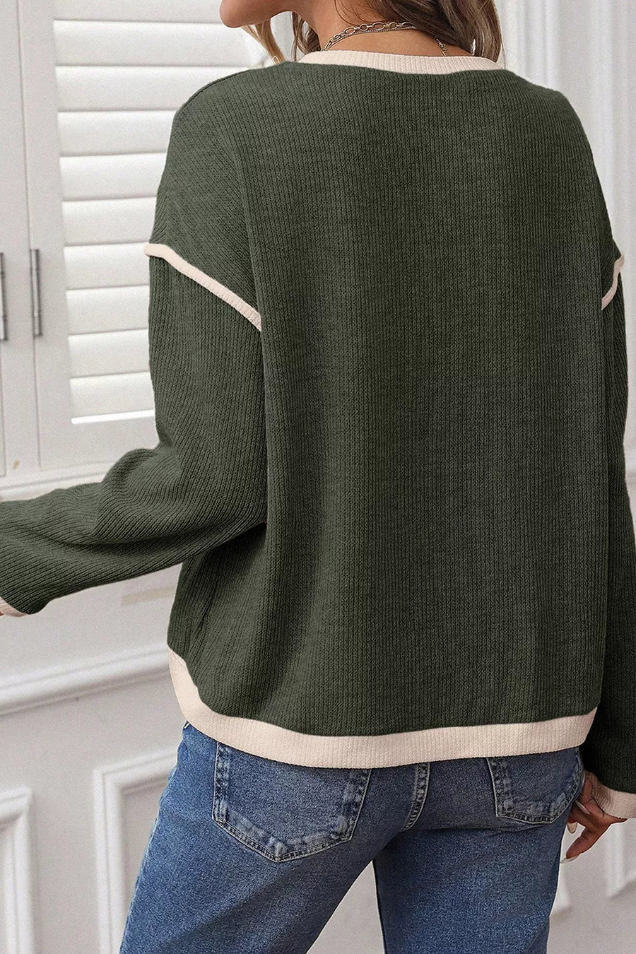97% polyester, 3% elastane Care instructions: Machine wash cold pullover sweater in Army Green with relaxed silhouette