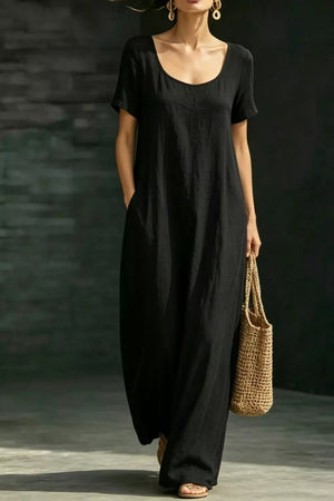 Black polyester maxi dress with short sleeves, scoop neck, and pockets.