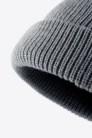 Gray ribbed knit beanie with folded edge detail
