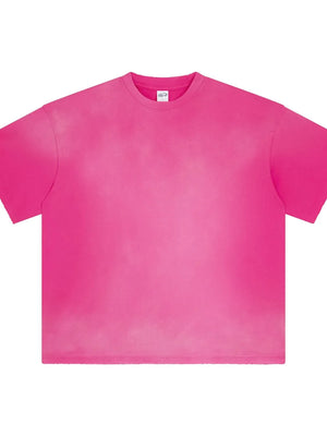 Oversized washed cotton crewneck tee in hot pink with a faded effect.